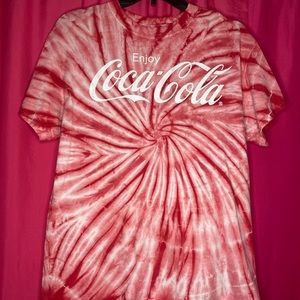 Red and white tie-dye coca-Cola shirt.